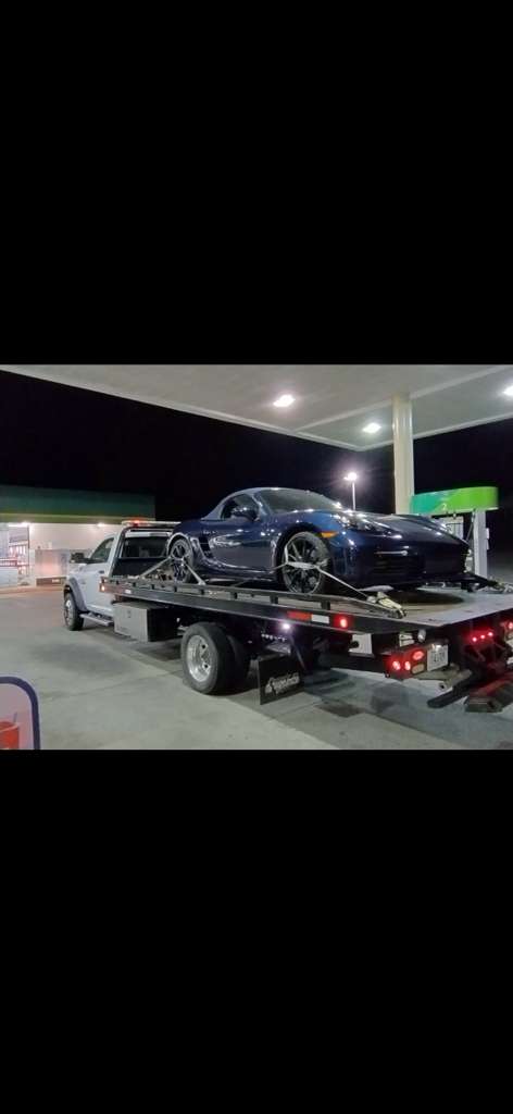 Motorcycle being loaded onto flatbed for safe towing in Chattanooga TN